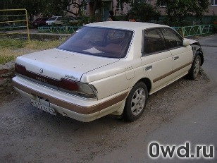 Битый автомобиль Nissan Laurel